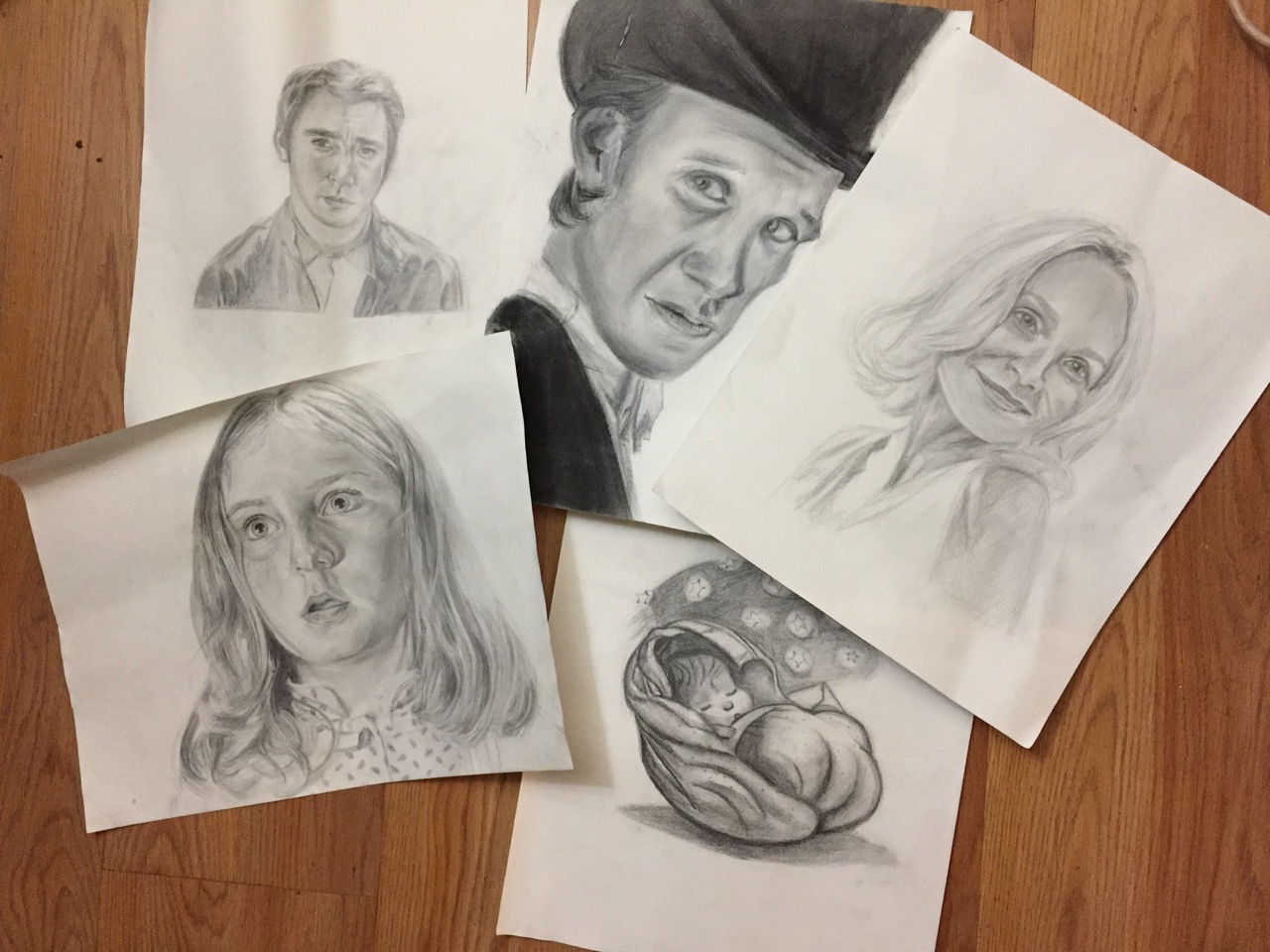 Graphite and charcoal portraits